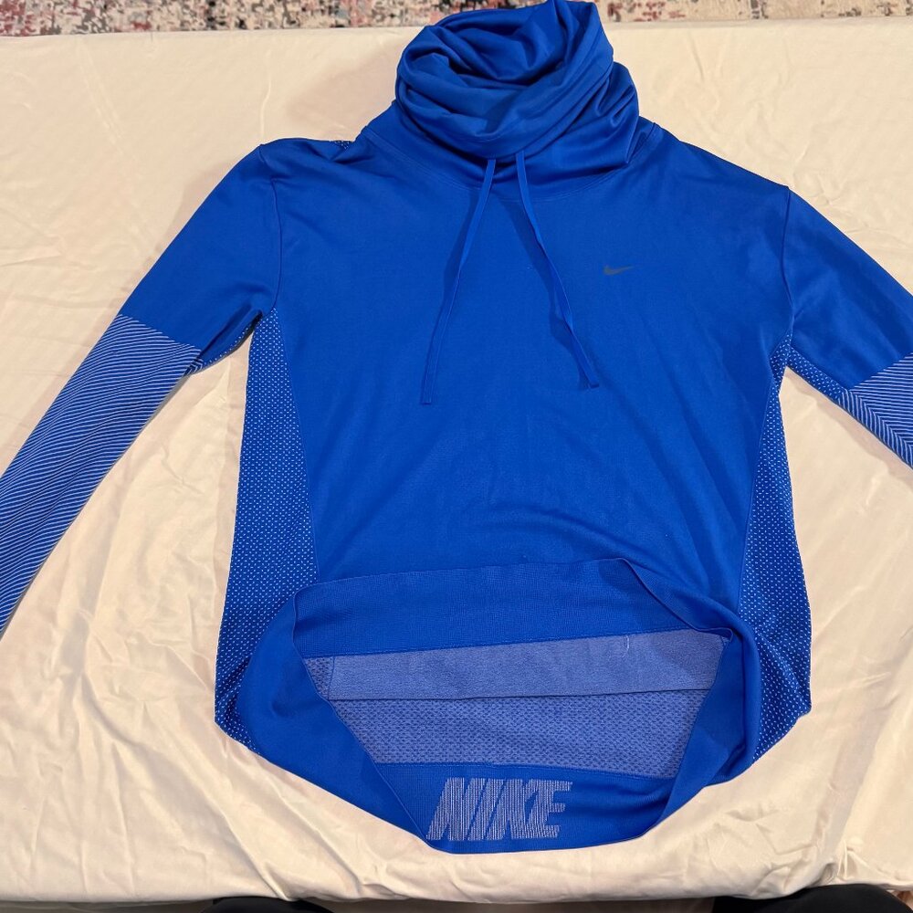 Nike Dri-FIT long sleeve funnel-neck training top in a bold royal blue